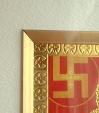 ガネーシャ神の額入りの絵の周辺に金縁があるタイプ
